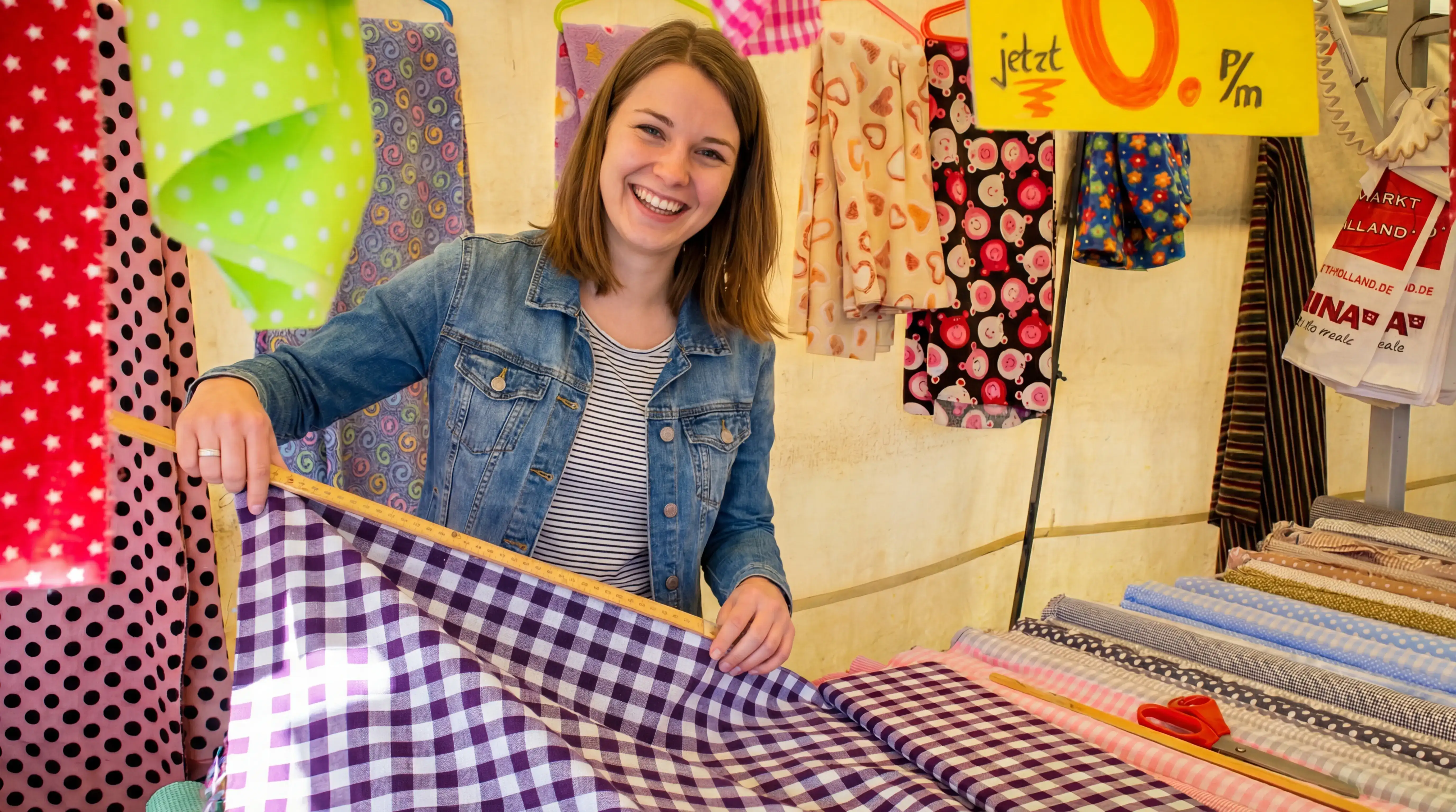 Colorful fabric rolls and sewing supplies at Stoffmarkt Holland